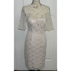 A Timeless Classic, A Lace Cocktail Dress Is Always In Fashion. This Floral Lace Illusion Dress Features Half Sleeves And Scoop Neckline. * Half Sleeve * Arm Pit To Arm Pit 16.5" * Length 36" * Lined * All Over Floral Lace * Hidden Back Zipper & Keyhole Button Closure * 55% Nylon, 45% Cotton * Lining: 100% Polyester * Dry Clean Or Hand Wash ** Retail Tag Is Mislabeled Has Bardot Tag ** Elegant Sheer Cream Dress, Elegant Sheer Lace Dress For Spring, Elegant Cream Lace Mini Dress, Elegant Cream Sheer Dress, Sheer Cream Lace Dress, Spring Formal Sheer Lace Dress, Beige Lace Dress For Formal Summer Events, Beige Lace Dress For Summer Formal Events, Elegant White Stretch Lace Dress