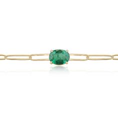 Introducing a stunning emerald paperclip bracelet that effortlessly combines elegance with modern design. The focal point is a captivating 2.65-carat oval cut emerald, showcasing a lush medium dark green color and semi-transparent clarity, complemented by its very good luster. Set in a four-prong claw setting, the emerald is beautifully positioned east to west and attaches to a 3.75mm wide paperclip-styled bracelet, meticulously crafted in 14k gold, providing a timeless and luxurious finishing touch. Length: 7.5-inches Setting Style: Prong Setting Material: 14K Yellow Gold Setting Weight: 5.7 Grams Main Stone: Emerald Shape: Oval Cut Weight: 2.65-Carats Dimensions: 10mm x 8mm Clarity: Semi-Transparent Color: Lush Medium Dark Green Luster: Very Good Treatments: Natural, Oiling Origin: Zambi Luxury Green Elegant Chain Bracelet, Luxury Modern Oval Gold Bracelet, Luxury Modern Green Bracelets, Luxury Elegant Green Chain Bracelet, Luxury Green Emerald Bracelet, Solitaire Bracelet, Paperclip Bracelet, Modern Bracelets, Mens Gold Rings