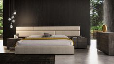 a modern bedroom with black walls and flooring is pictured in this image, the bed has an upholstered headboard