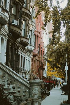 an iphone case with buildings and trees on the street in new york city, ny