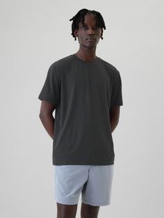 Soft, stretch performance T-shirt in moisture-wicking, breathable jersey.  Crewneck.  Short sleeves.  Fit: Relaxed.  A straight & easy fit with a relaxed sleeve.  For a Classic fit, go down one Tech T Shirts, African Men, New Woman, Moisture Wicking, Cotton Tshirt, Gap, Short Sleeves, Crew Neck, T Shirt