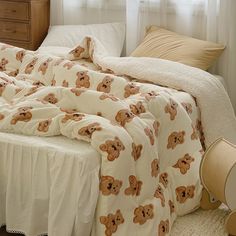 there is a bed with teddy bears on it