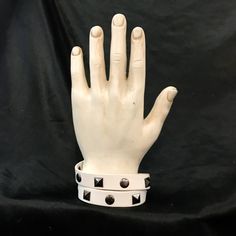 "This is made from a recycled vintage belt. It can be wrapped around your neck as a collar, or wrapped twice around your wrist as a cuff bracelet. These bracelets are made from man made materials, and are white with round silver studs and Pyramid silver studs. 3 heavy duty snaps closes this cooler/wrist cuff. It fits necks up to 16\" around, the middle snap fits necks up to 15\" around, and the inner most snap fits necks up to 14\" around. The entire necklace/bracelet is 17 1/4\" Long, 1/2\" Wid Leather Wrist Cuff, Silver Hair Comb, Bangles Style, Vintage Belt, Wrist Cuffs, Vintage Belts, Unisex Jewelry, Leather Silver, Neck Collar