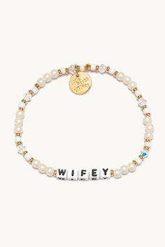 Let’s celebrate all the wifeys in our lives! Gift this handcrafted faux pearl bracelet to the girlie who’s about to wed her prince charming or the woman who’s been happily married for two decades. Part of a Bigger Story: Little Words Project is all about spreading kindness and empowerment through words. By wearing this bracelet, you become part of a larger community that shares the power of words. Bead Pattern: Bling Bling Hand-crafted, faux pearl and crystal beaded bracelet Plated Brass Hardwar Adjustable Personalized Pearl Bracelet, Pearl Charm Bracelet For Wedding, Elegant Pearl Bracelet With Letter Beads, Adjustable Pearl Charm Bracelet For Wedding, Elegant Pearl Beaded Bracelets With Letter Beads, Elegant White Bracelet For Bridal Shower, Personalized White Bracelets For Party, White Charm Bracelet For Mother's Day, Party Bracelet With Letter Beads