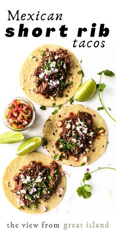 mexican short rib tacos with guacamole, salsa and lime on the side