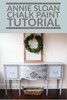 an antique chalk paint table with a wreath on top and the words annie sloan chalk paint tutor