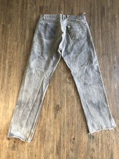 Vintage 501 Levi's Distressed Black Denim Jean Pants Original San Fransisco Made Levi's Denim Tag Reads Men's Size : W 36 L 34 Made in USA Willing to Answer Any and All Questions about Items. All Items Sold AS IS. No Refunds. No Returns. Note* Items are not laundered unless adopted personally before selling, to reduce costs & to help combat the ongoing drought in California. For More Photos & Other Items Visit : ikilledKiki.com Light Wash Stonewashed Straight Leg Bottoms, Distressed Dark Wash Rigid Denim Bottoms, Washed Black Stonewashed Straight Leg Bottoms, Distressed Gray Cotton Bottoms, Stonewashed Straight Leg Bottoms In Washed Black, Vintage Stonewashed Relaxed Fit Bottoms, Distressed Light Wash Rigid Denim Bottoms, Light Wash Distressed Rigid Denim Bottoms, Faded Rigid Denim Bottoms With Standard Cut Leg