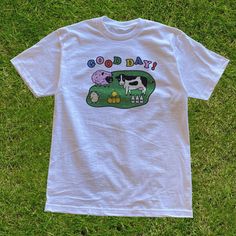 These farm shirt is perfect for those who love the colorful and wonderful kawaii clothing and kidcore clothing aesthetic. It's kawaii shirt and kidcore shirt for those who loves the farm life or those who just simply grew up playing farming simulation games. This Y2K Aesthetic T Shirt is a perfect gift for her, gift for him, gift for gamers or anyone in between as these shirts are unisex. Available in Sizes XS, S, M, L, XL, 2XL and 3XL. ✨ 100% ⭐️ PREMIUM ⭐️ Airlume combed and ringspun cotton  ✨ Cute Summer T-shirt With Graphic Design, Cute Summer Graphic T-shirt, Cute Short Sleeve Graphic Print Shirt, Cute White Crew Neck Shirt, Cute Printed White Shirt, Playful Relaxed Fit Shirt With Graphic Print, Cute White Cotton T-shirt, Cute Spring Shirt For Streetwear, Playful White Crew Neck Shirt