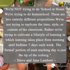 two children sitting at a table with a sign that says we're not trying to do school at home