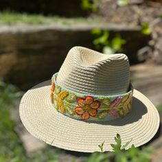 Our Fedora Straw Hat, comes with a removable hand embroidered band. The band is embroidered by Female Artisans of the Andes in Perú. This classic Fedora style Hat can be used in the beach and all adventures in the sun. Perfect for travelling. Three options for bands available: Spring Flowers, Mint and Rust Flowers, Browns One size Fedora Hat Summer, Rust Flowers, Fedora Style, In The Beach, Hat Summer, Summer Hat, Women Artisans, Fedora Hat, Summer Hats