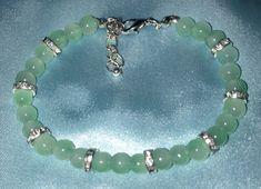 Glass Bead Bracelet With Silver Cubic Zirconia Spacers and  Stainless Steel Hypoallergenic Hardware Glass Bead Bracelet, Bronze Hardware, Glass Beaded Bracelets, Jade Green, Bead Bracelet, Charm Bracelets, Glass Bead, Crystals And Gemstones, Favorite Jewelry