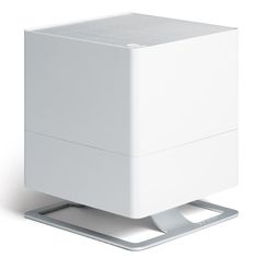 a white box sitting on top of a metal stand