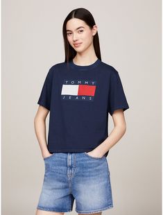 Tommy Hilfiger women's T-shirt. This pure cotton T-shirt is proudly printed with the iconic Tommy flag badge, making it a streetwear wardrobe hero. Part of our Tommy Jeans collection.  Material: 100% Transitional Cotton ,  In-conversion. Boxers Briefs, Swim Fashion, Jeans Online, Tommy Hilfiger Women, Swimwear Outfit, Dark Night, Polo Dress, Fit N Flare Dress, Tommy Jeans