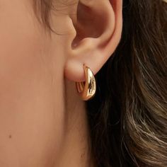 Description - Minimal and unique, our new Gold Coast Hoops are the cutest addition to earring stack. Made of high-quality durable material, perfect for everyday wear! • Width : 13mm • Premium Quality Copper + 18k gold plating • Water-Resistant & Sweatproof - shower, swim, and exercise with it, the color remains perfect • Hypoallergenic Jewelry Care: - Wipe with a soft cloth + jewelry cleaner every 3-4 months for a clean polished look. Sunnie Jewelry 1 year warranty Trendy Gold Plated Cartilage Earrings For Everyday, Trendy Everyday Gold Plated Cartilage Earrings, Trendy 14k Gold Filled Huggie Earrings, Trendy Gold Cartilage Earrings For Everyday, Trendy Rose Gold Tarnish-resistant Huggie Earrings, Trendy 14k Gold Filled Earrings For Everyday Wear, Trendy Everyday Gold Cartilage Earrings, Earring Stack, Cloth Jewelry