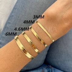 All Our Bracelets Are Made Of REAL 14K GOLD  14K Solid Gold Herringbone Bracelet, 7" 8", 3mm 4mm 4.6mm 6mm Thick, Real Gold Bracelet, Delicate Gold Bracelet, Flat Gold Bracelet, Women  Shop our 14K Bracelets https://www.etsy.com/shop/GOLDMANIA?ref=seller-platform-mcnav§ion_id=26925987  Shop On Sale items https://www.etsy.com/shop/GOLDMANIA?ref=seller-platform-mcnav§ion_id=1  Metal: 14K Solid Yellow Gold (Not Hollow) Width: 3 mm, 4 mm, 4.6 mm, 6 mm Length: 7", 8" Inch Closure: Lobster claw  3.0 M Gold Bracelet Women, Real Gold Bracelet, Delicate Gold Bracelet, Gold Herringbone Chain, Thick Gold Chain, Herringbone Bracelet, Real Gold Chains, Rose Gold Hoop Earrings, Dainty Gold Bracelet