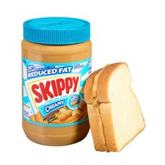 a peanut butter sandwich next to a jar of skippy cream