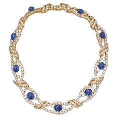 Indulge in the allure of the estate diamond and sapphire necklace by M. Gerard, a masterpiece that marries classic elegance with natural splendor. This exquisite necklace boasts nine sapphire cabochons, each a unique testament to nature's artistry, their dimensions ranging from approximately 15.5 x 8.5 x 5.0 to 7.7 x 7.6 x 4.5 mm. The sapphires exude a mesmerizing depth of color and charm that captures the eye and heart. They are gracefully complemented by a cascade of round diamonds, their collective weight shimmering between 32.00 and 36.00 carats, adding a touch of opulence and brilliance. With a length of 14 inches, this necklace drapes gracefully around the neckline, enhancing the wearer's natural beauty. It is proudly signed by M. Gerard and bears the distinguished mark of number 448 Diamond And Sapphire Necklace, Van Cleef & Arpels, Diamond Necklaces, Colored Gems, Art Objects, Sapphire Necklace, Van Cleef Arpels, Van Cleef, Belleza Natural