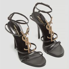 Saint Laurent Cassandra Black Ysl Medallion Stiletto Sandals. 100% Authentic, Purchased From Saint Laurent In Venice, Italy For $1,350.00. Comes With Box, 2 Dustbags, Cards, And Extra Heel Tabs. Size 38 Eu, Fits Like A 7.5-8 Us. In Excellent Condition, Very Light Wear As Shown In Photos. Only Worn Twice. All Condition Is Pictured. Saint Laurent Black Smooth Bovine Leather Sandals With Signature Ysl Monogram Hardware In Bronze Gold Color. 4.33" Stiletto Heel. Open Toe. Branded Leather Insole. Three Band Upper. Adjustable Ankle Strap. Leather Lining And Sole. "Cassandra" Is Made In Italy. *First And Last 2 Photos Are Reference Stock Photos* Bronze Gold, Saint Laurent Shoes, Stiletto Sandals, Venice Italy, 2 Photos, Stiletto Heel, Leather Sandals, Shoes Women Heels, Stiletto Heels