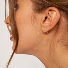 These timeless 1-inch hoop earrings are a versatile accessory that everyone needs in their jewelry collection! Expertly designed in non-tarnishing 14K white gold, these gorgeous earrings feature an endless backing that will keep your accessory secure all day. Whether these chic hoops are worn to the office or a black tie event, they will elevate any outfit by adding a sophisticated and stylish flair. If you are looking for your next staple accessory that is sure to turn heads, this is the piece Nickel-free Small Hoop Earrings In White Gold, Silver Hypoallergenic Open Circle Hoop Earrings, Everyday Silver Open Circle Hoop Earrings, Silver Hypoallergenic Hoop Earrings, Hypoallergenic Silver Open Circle Hoop Earrings, Minimalist Hypoallergenic Hoop Earrings For Anniversary, Small Hoop Earrings In White Gold For Everyday, Minimalist Nickel-free White Gold Hoop Earrings, White Gold Hoop Earrings For Everyday