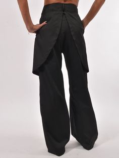 "Asymmetrical designer pants are one of our top products.  The pants have an interesting and unique design that allows it to be worn daily. Can be combined with sports or everyday shoes.  You can wear the pants in a long or 7/9 configuration.  ■ ConceptBG is your perfect choice for incredible & unique style. Each item is made to order according to the size you pick, we do not hold stock. ■ SIZING ■ This piece comes in sizes from XS to 4XL. The model is wearing size M. ■ SIZE CHART ■ SIZE XS US/Canada 2 UK 4 Europe 32 Bust: around 33 in / 84 cm  Waist: around 26 in / 66 cm Hip: around 35.5 in / 90 cm Approx. height: 5'5\" / 165 cm  SIZE S US/Canada 4/6 UK 6/8 Europe 34/36  Bust: around 35 in / 88 cm Waist: around 28 in / 70 cm Hip: around 37 in / 94 cm Approx. height: 5'5\" / 165 cm  SIZE M Avant-garde Cotton Bottoms With Pockets, Workwear Bottoms With Belt Loops And Asymmetrical Hem, Casual Pants With Asymmetrical Hem For Work, Casual Workwear Pants With Asymmetrical Hem, Asymmetrical Hem Bottoms With Belt Loops For Work, Avant-garde Wide Leg Bottoms For Spring, Spring Bottoms With Belt Loops And Asymmetrical Hem, Avant-garde Bottoms With Pockets, Versatile Workwear Bottoms With Asymmetrical Hem