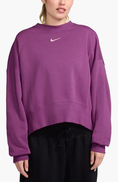 An embroidered Swoosh adds minimal branding to this cozy fleece sweatshirt cut for a relaxed, oversized fit that's enhanced by the dropped shoulders. 22" length (size Medium) Crewneck 80% cotton, 20% polyester Machine wash, tumble dry Imported Nike Phoenix Fleece, Minimal Branding, Purple Sweatshirt, Cut Sweatshirts, Nike Purple, Birthday List, Fleece Sweatshirt, Good Brands, Oversized Fits