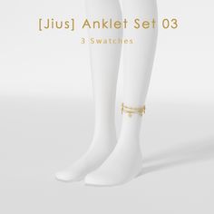 two pairs of white socks with gold chains on the ankles and anklets that are attached to each other