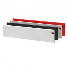 three different colored and black and white items on a white surface with red trim around the edges