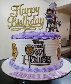 a birthday cake that is decorated with cartoon characters