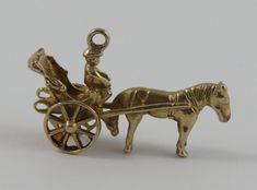 "This is a vintage \"Horse-Drawn Carriage With Driver\" 10 karat gold charm for a charm bracelet. It weighs 5.35 grams and measures 1 1/4\" x 3/4\", tested 10K All charms come with a split ring to attach to a bracelet. We have hundreds of charms in stock. If you don't see what you are looking for in our shop please contact us as it is likely we have it. Inventory #G2741" Antique Brass Charms For Collectors, Antique 14k Gold Charms For Collectors, Diamond Carat Size, 10k Gold Bracelet, Shiny Bracelets, Bracelet Luxury, Diamond Bracelet Design, Jewelry Staples, Classic Bracelets