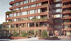 an artist's rendering of a brick building with plants growing on the balconies