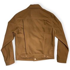 12ozUSA Type II JACKET Mount Vernon Mills Duck Canvas VARIOUS COLORS #133 This overall style is inspired by the classic 1953 Type II Jacket. The style shown in the pictures is in our Regular Fit but does come in the Slim Fit also, It's designed to hit right at the waistline for a compact look. It has two full double pockets on the front. The pocket flaps are secured with our custom CFDCo hardware and the pockets are bar tacked at the corners. Taped seams is used on armhole seams, and for an extra cost, the sleeve seams and body seams are taped inside for extra durability. also the added our signature copper rivet at the cuff open to secure the seam. The first fabric we used had to be an America Classic. To us that means it is an America staple from the start and ages gracefully. Only secon Classic Winter Outerwear With Selvedge Detail, Classic Winter Outerwear With Selvedge, Fitted Selvedge Outerwear For Workwear, Classic Cotton Utility Jacket With Double-needle Stitching, Classic Brown Utility Jacket For Streetwear, Classic Fitted Brown Utility Jacket, Fitted Classic Brown Utility Jacket, Fall Cotton Selvedge Outerwear, Selvedge Long Sleeve Outerwear For Streetwear