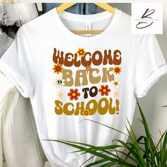 Welcome Back to School Shirt Perfect gift for teachers and administrators to welcome students back to school! The Bella+Canvas 3001 Unisex t-shirt has a retail fit, meaning it's slightly fitted but not too snug. 100% Airlume combed and ringspun cotton  Light fabric  Retail fit Tear away label Runs true to size CARE INSTRUCTIONS-  Turn garment inside out before wash.- Wash with cold water.- Do not dry clean, lay flat to dry.- Do not iron directly on the design. SHIPPING PROCESS* Your order will b Affordable Back To School T-shirt With Text Print, Cheap Back To School T-shirt With Text Print, Gift For Principal, Principal Gifts, Welcome Students, Welcome Back To School, School Tees, Back To School Gift, School Gift