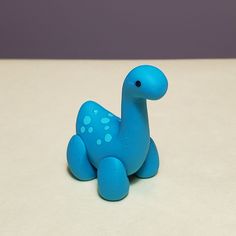 a blue toy sitting on top of a table