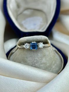 Antique C.1920 Sapphire and Diamond 3 Stone Ring in 18ct Yellow Gold & Platinum  the sweetest sapphire stone in the middle of two lovely diamonds!  The item comes without the box in the photos but will be presented in a gembank1973 gift box   Measurements: Weight 3.07g, size UK O / US 71/2, head of ring 11mm x 4mm, height off finger 4mm Materials: 18ct Yellow Gold, platinum, sapphire and diamond    Hallmarks: stamped 18ct Condition : The overall condition is very good office use: SOD2 Anniversary Three-stone Diamond Sapphire Ring, Formal Three Stone Diamond Birthstone Ring, Heirloom Sapphire Ring With Diamond, Sapphire Three Stone Diamond Anniversary Ring, Sapphire Three Stone Diamond Ring For Anniversary, Sapphire Diamond Ring With Rose Cut Diamonds For Gift, Emerald Cut Sapphire Ring With Three Stones, Emerald Cut Sapphire And Diamond Three Stone Ring, Asscher Cut Sapphire Three Stone Ring Gift