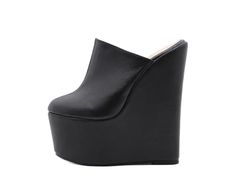 Take your wardrobe to new heights with these Always Confident Extreme Wedge Heels. Featuring a black PU material with a closed toe design and an extreme platform height, we're obsessed. Black Wedge Sandals With Thick Bottom, Black High Heels With Thick Bottom, Black High Heel Platform Wedge Sandals, Black Closed Toe Heels With Thick Bottom, Black Chunky Platform Wedge Boots, Black Platform High Heel Wedge Boots, Party Platform Wedge Boots, Party Wedge Boots With Platform, Black Platform Wedge Heels