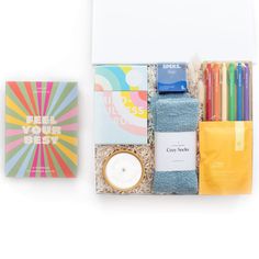 an assortment of stationery items in a gift box