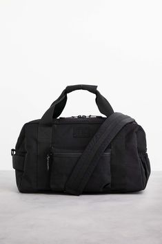 Convertible Travel Duffle Bag | Béis Sporty Black Luggage For On-the-go, Black Nylon Duffle Bag With Luggage Sleeve, Functional Nylon Duffle Bag With Adjustable Strap, Black Travel Bag For Overnight Trips, Functional Shoulder Bag With Adjustable Strap For Overnight Trips, Black Standard Backpack For Overnight Trips, Black Backpack For Overnight Trips, Functional Backpack Duffle Bag With Zipper, Functional Backpack-style Duffle Bag With Zipper