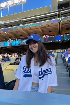 a girl smiling in a dodgers outfit La Dodgers Hat Outfit, Dodgers Hat Outfit, Sporting Event Outfit, Ashy Brown Hair, Dodgers Outfit, Outfit Jersey, Ashy Brown, Baseball Lifestyle, La Dodgers Hat