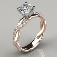 an engagement ring with a twisty band and a diamond center stone in the middle