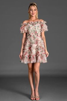 Elegance personified in our floral ruffle mini dress. This charming dress features an all-over floral print and delicate ruffle details that add a playful touch to your look. The mini length is perfect for showing off your legs, while the high-quality fabric ensures a comfortable and flattering fit. Designed to enhance your natural beauty, this dress is ideal for garden parties, brunch dates, or any occasion where you want to exude effortless style. Handmade customization Fabric composition: 90% Spring Feminine Knee-length Ruffle Dress, Knee-length Ruffle Dress For Spring Garden Party, Chic Floral Print Ruffle Dress For Garden Party, Pink Floral Print Ruffle Dress For Party, Feminine Floral Mini Dress, Feminine Floral Dress With Ruffled Straps For Garden Party, Flirty Floral Print Dress For Garden Party, Mini Floral Print Dress For Brunch, Floral Print Ruffle Dress For Party