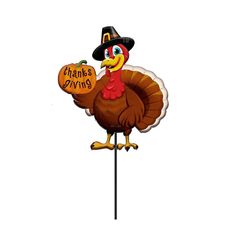 a thanksgiving turkey on a stick with a sign that says, thanks and givings