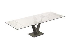 a white marble dining table with metal base