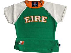 Ireland Eire French Terry Stretch to fit shirt Crop tee form fitted stretchable shirt  really soft 95%cotton 5%polyester Please refer to size chart in pictures note it does stretch all around. Please make sure measurements are good many people have said it's too small. Please double check. Thank you White Fitted T-shirt With Cap Sleeves, Fitted Cotton T-shirt With Cap Sleeves, Basic Cap Sleeve Cotton Top, White Cotton Cap Sleeve Top, Stretch Cotton Cap Sleeve Top, Fitted Short Sleeve Graphic Tee Shirt, Sporty Snug Fit Short Sleeve T-shirt, Green Stretch Cotton T-shirt, Stretch Cotton T-shirt With Cap Sleeves