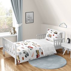 a child's bedroom with white furniture and blue curtains