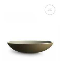 an empty bowl on a white background with the words new glaze above it in black