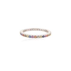 a white gold ring with multicolored stones