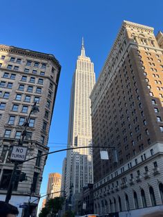 the empire building towering over new york city