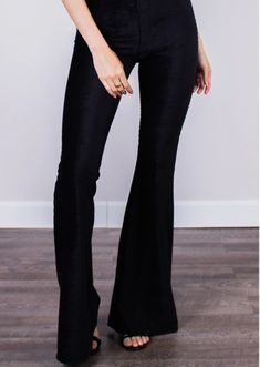 Fitted black high-rise corduroy pant with a bell bottom silhouette. Fits true to size. Stretch Flare Corduroy Bottoms, Stretch Corduroy Flare Bottoms, Black Flares For Fall Party, High Waist Black Flares For Party, High Waist Black Party Flares, Black High-waist Party Flares, Flared Velvet Bottoms, Chic Black Flares For Fall, Black Fitted Velvet Pants