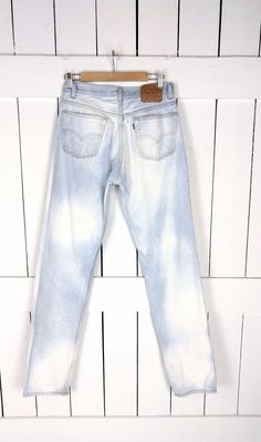 "501 bleached button fly denim jeans/vintage straight leg blue jeans/faded Levi Strauss jeans/30 x 34 Measurements...taken flat -across waist: 15\" -across hips: 20\" -inseam: 34\" -rise: 11\" -best fits: 30 x 34 -marked size: 33 x 36 Features... -classic pair of denim jeans -the perfect light blue wash...perfectly worn in and faded -bleached effect -straight leg -button fly -high waist style -100% cotton -label: Levis 501 -made in USA Condition: -great vintage condition -bleached effects throug Medium Wash Straight Leg Bleached Jeans, Bleached Straight Leg Medium Wash Jeans, Medium Wash Bleached Straight Leg Jeans, Fitted Light Wash Bleached Jeans, Light Wash Bleached Fitted Jeans, Fitted Straight Leg Bleached Jeans, White Bleached Straight Leg Jeans, High Rise Faded Bleached Jeans, Faded Bleached High Rise Jeans