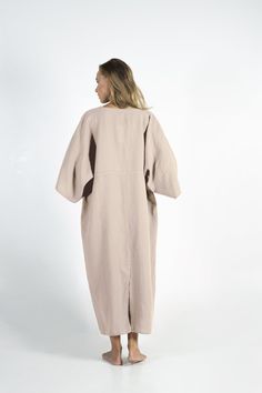 "This carefully tailored women's ONE SIZE dress is made of cool and light pure linen. It's a stylish outfit for women with distinct taste, for any occasion. NO BUTTONS, NO BUTTONHOLES, NO ZIPS ZERO SHRINKAGE FITTING: The model appearing in the photo is 176cm (5' 9\") tall. Because of the kaftan's loose style ONE size FITS ALL. ONE SIZE -RECTANGULAR PATTERN BUST-WAIST-HIPS 134cm/ 53\" LENGTH 130CM / 51\" Thank you for shopping from YUMElabel. Enjoy this beautiful linen garment !" Oversized Linen V-neck Tunic, Oversized Linen V-neck Dress, Beige Kaftan For Spring Daywear, Oversized Linen Tunic For Loungewear, Long Linen Kaftan, Casual Beige Kaftan For Spring, Beige Lagenlook Linen Dress, Oversized Linen Kaftan For Spring, Oversized Linen Tunic For Daywear